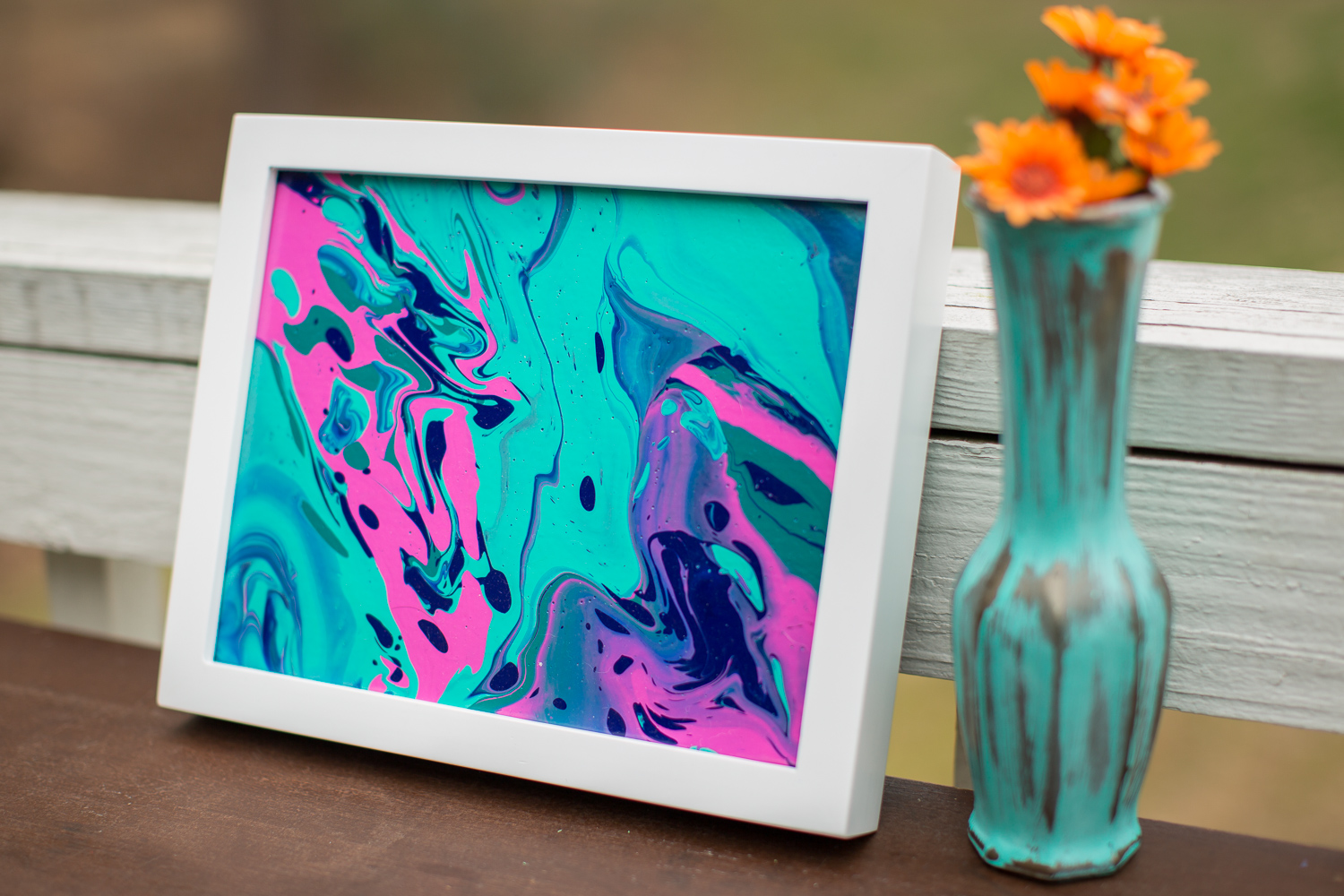 Abstract aqua and pink pour painting by North Carolina artist Courtney Potter.