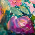 Detail of an abstract pink flower against a teal background from an acrylic floral painting.